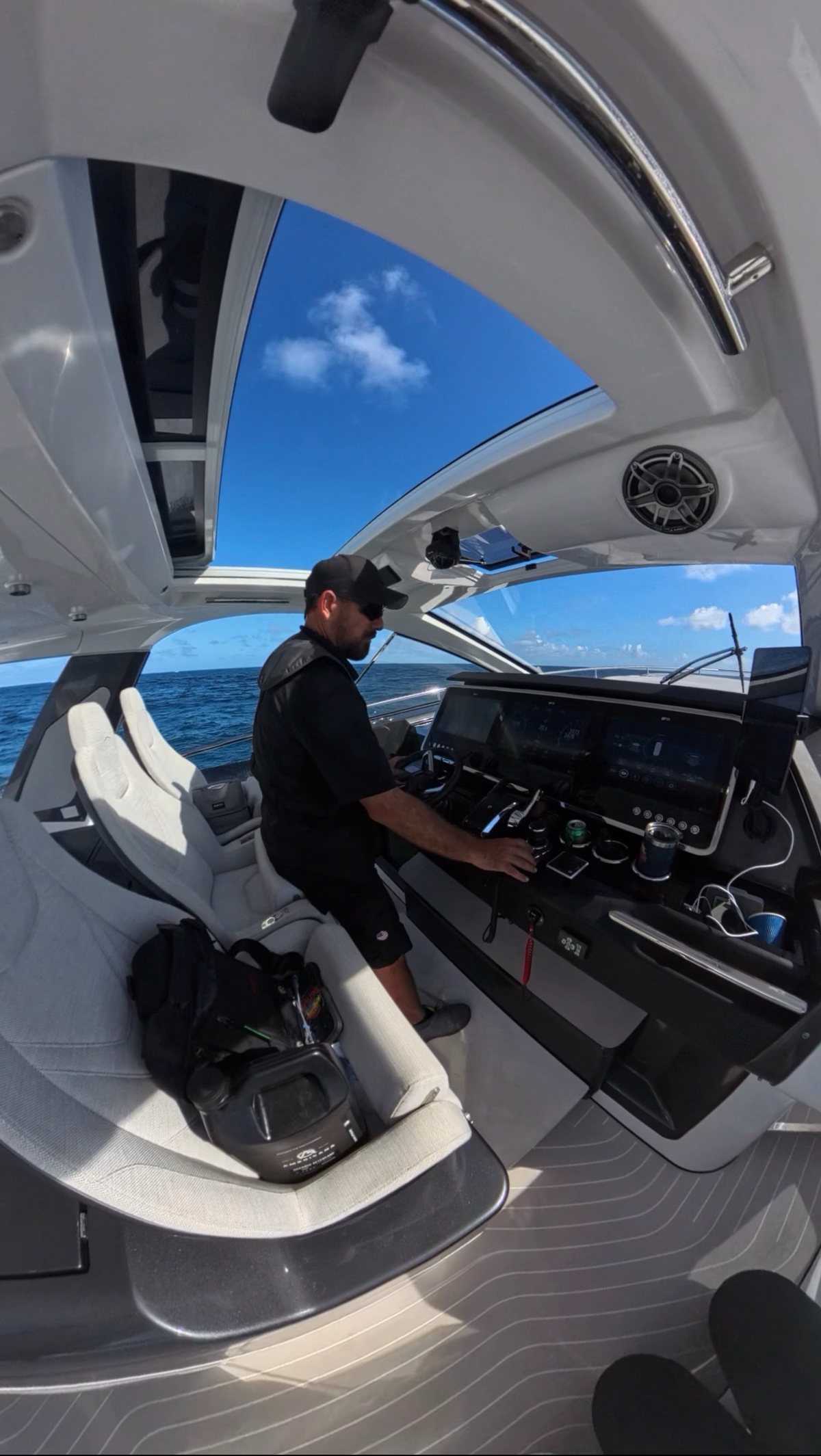 Capt. José Martín at the helm of his Azimut 55S at sea