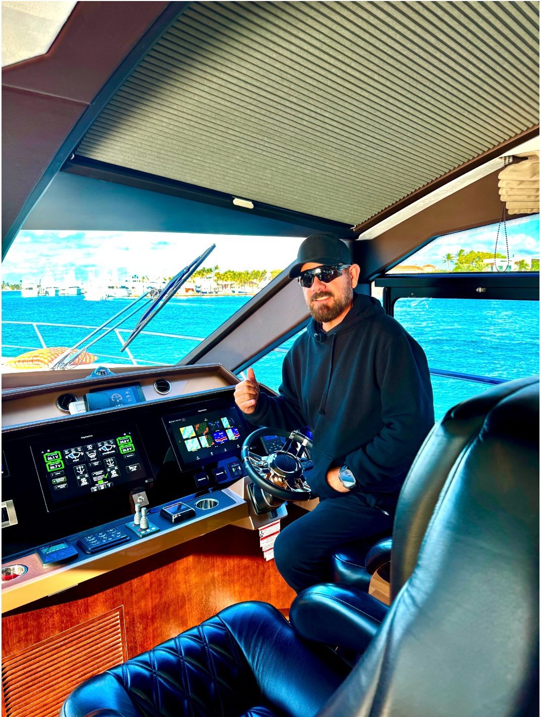 Capt. José Martín at the helm inside his Azimut 55S